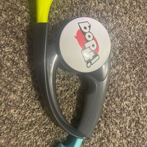 Bop It! Game with Gray and Yellow Accents